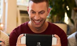 Nintendo Switch modèle OLED 06 7 2021 console hardware blanc lifestyle head 13